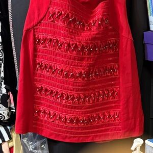 Chic Red Women's Top with Intricate Detailing
